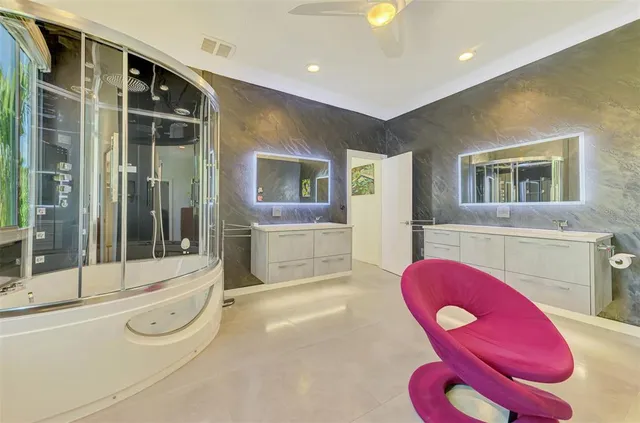 a view of a house with a yard and potted plants