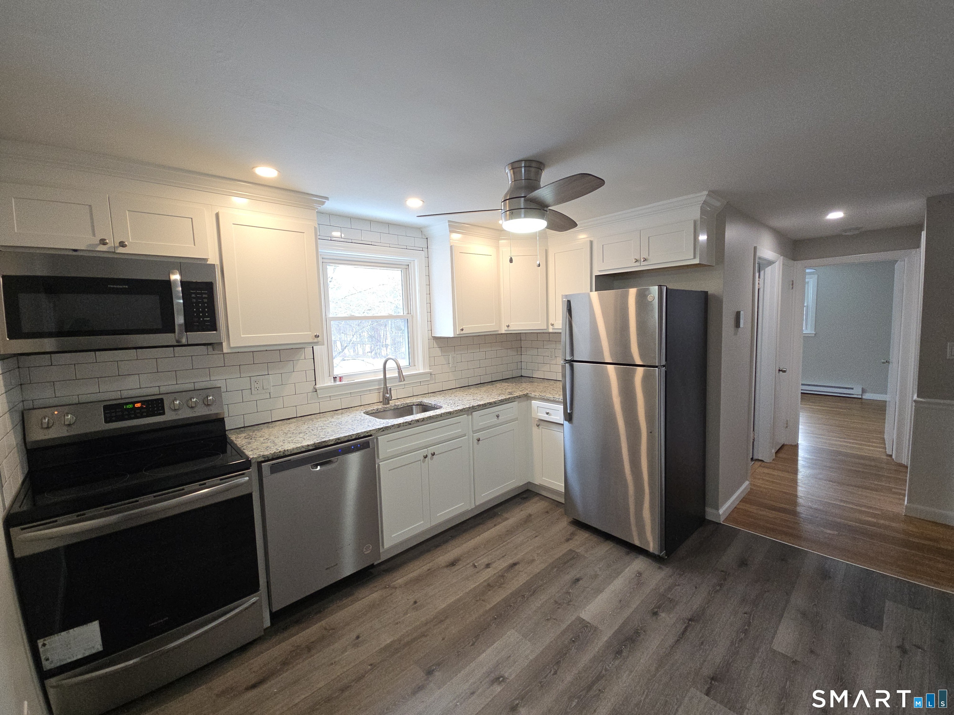 103 Hebron Road Marlborough, CT 06447 - Photo 5 of 10 a kitchen with a refrigerator sink and microwave