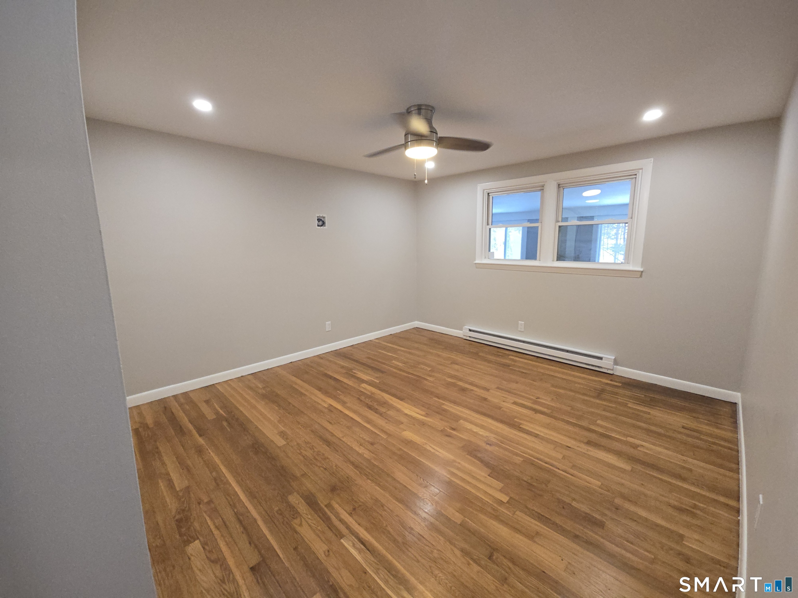 103 Hebron Road Marlborough, CT 06447 - Photo 9 of 10 a view of empty room with wooden floor