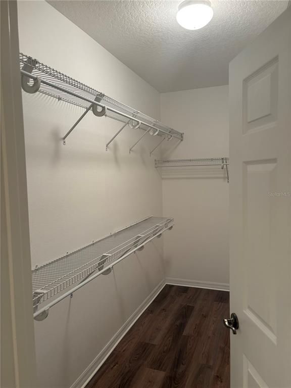 8168 Boat Hook Loop, Unit 707 Windermere, FL 34786 - Photo 16 of 17 a view of a room with racks on the wall