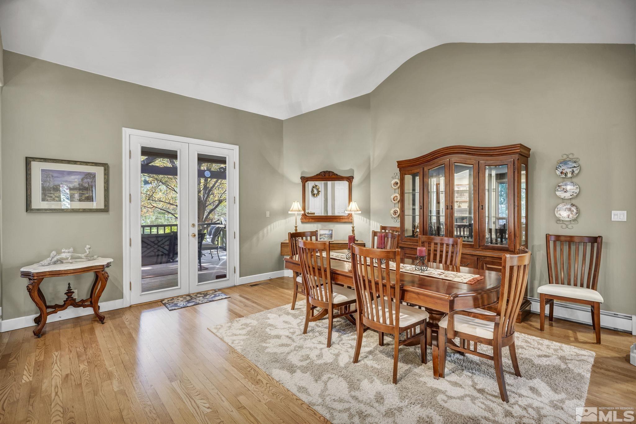 4277 Bitteroot Road Reno, NV 89519 - Photo 11 of 40 a view of a livingroom with furniture window and wooden floor