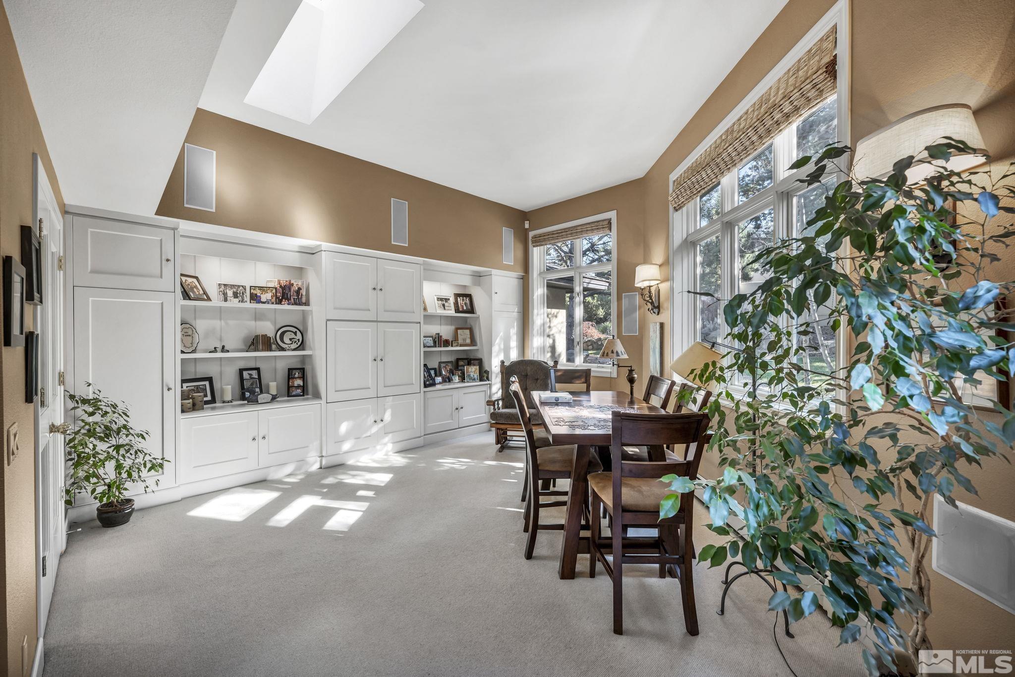 4277 Bitteroot Road Reno, NV 89519 - Photo 21 of 40 a workspace with furniture and a potted plant