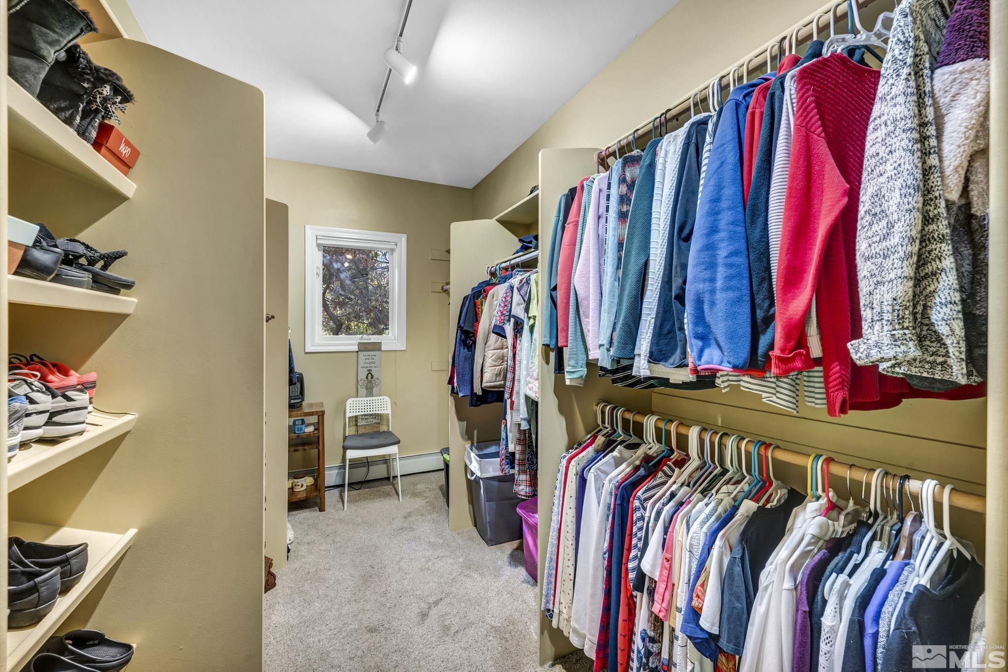 4277 Bitteroot Road Reno, NV 89519 - Photo 34 of 40 a view of walk in closet with clothes