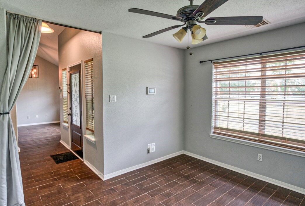 308 County Road 893B Angleton, TX 77515 - Photo 11 of 41 a view of an empty room with a window