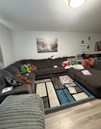 a living room with furniture and furniture