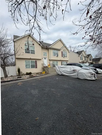 a view of a town with barn house