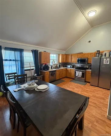 a view of a dining room with furniture