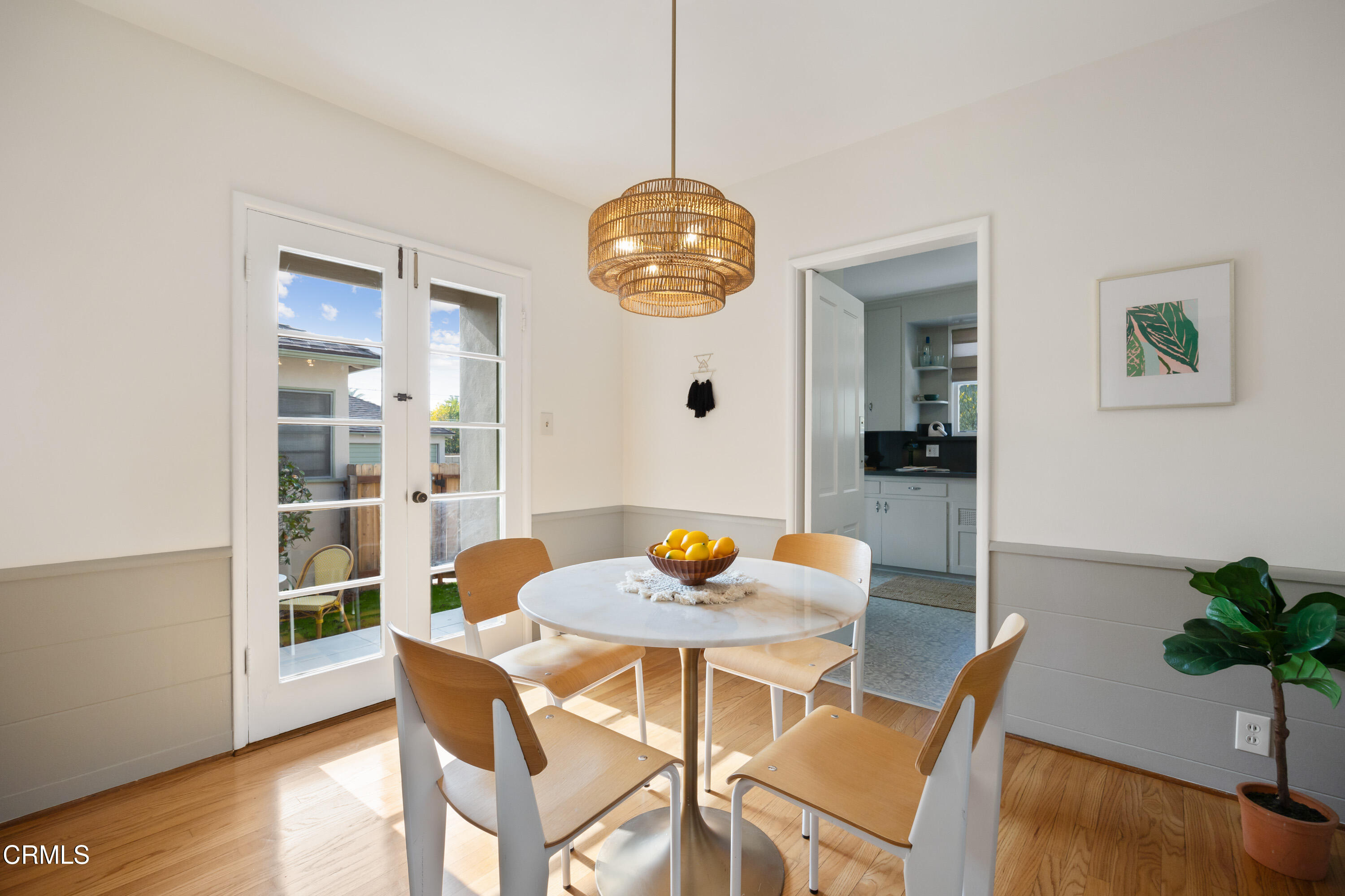 1766-1768 Whitefield Road Pasadena, CA 91104 - Photo 15 of 52 a dining room with furniture potted plants and wooden floor