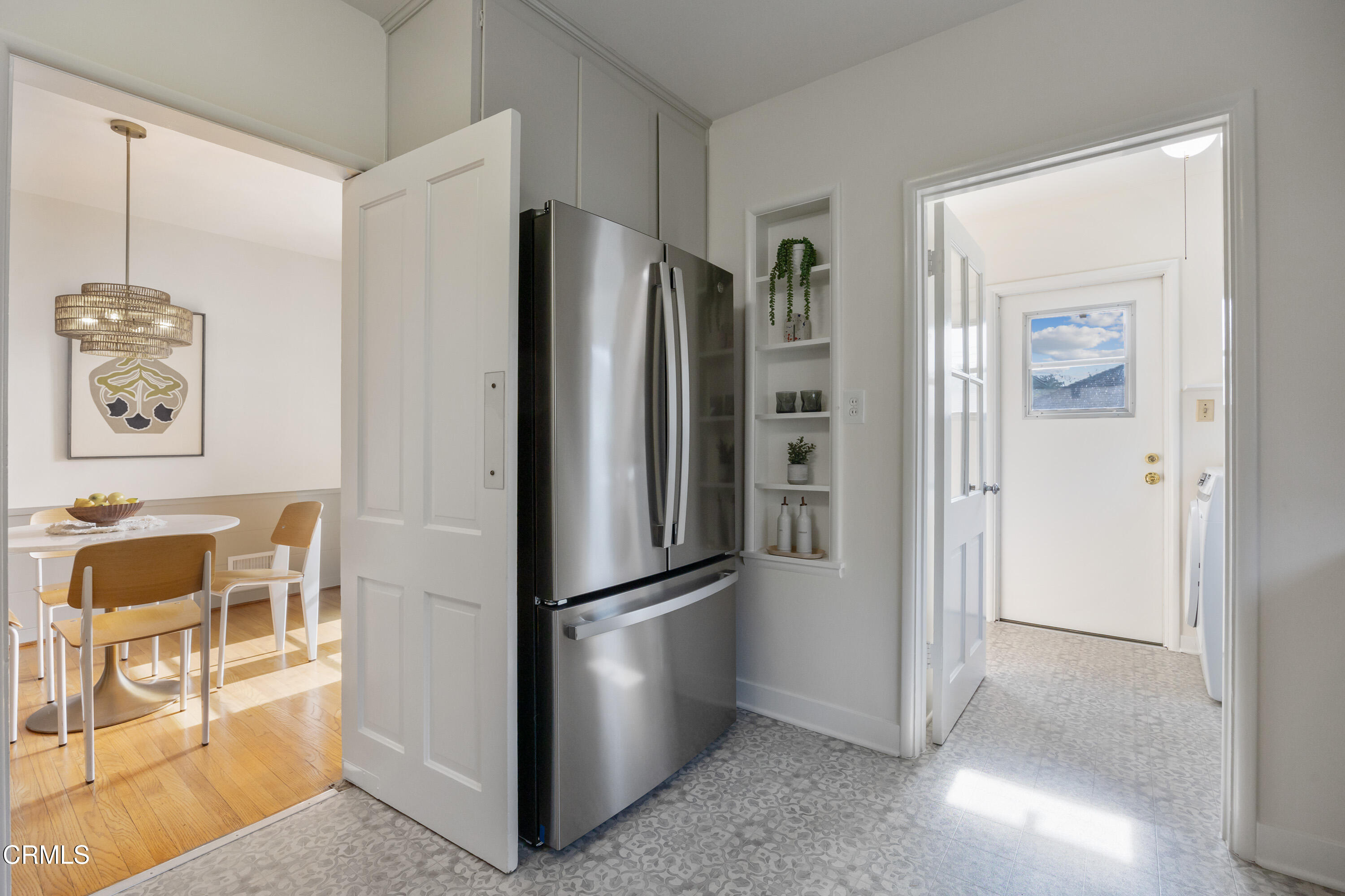 1766-1768 Whitefield Road Pasadena, CA 91104 - Photo 22 of 52 a view of a refrigerator in kitchen and an empty room
