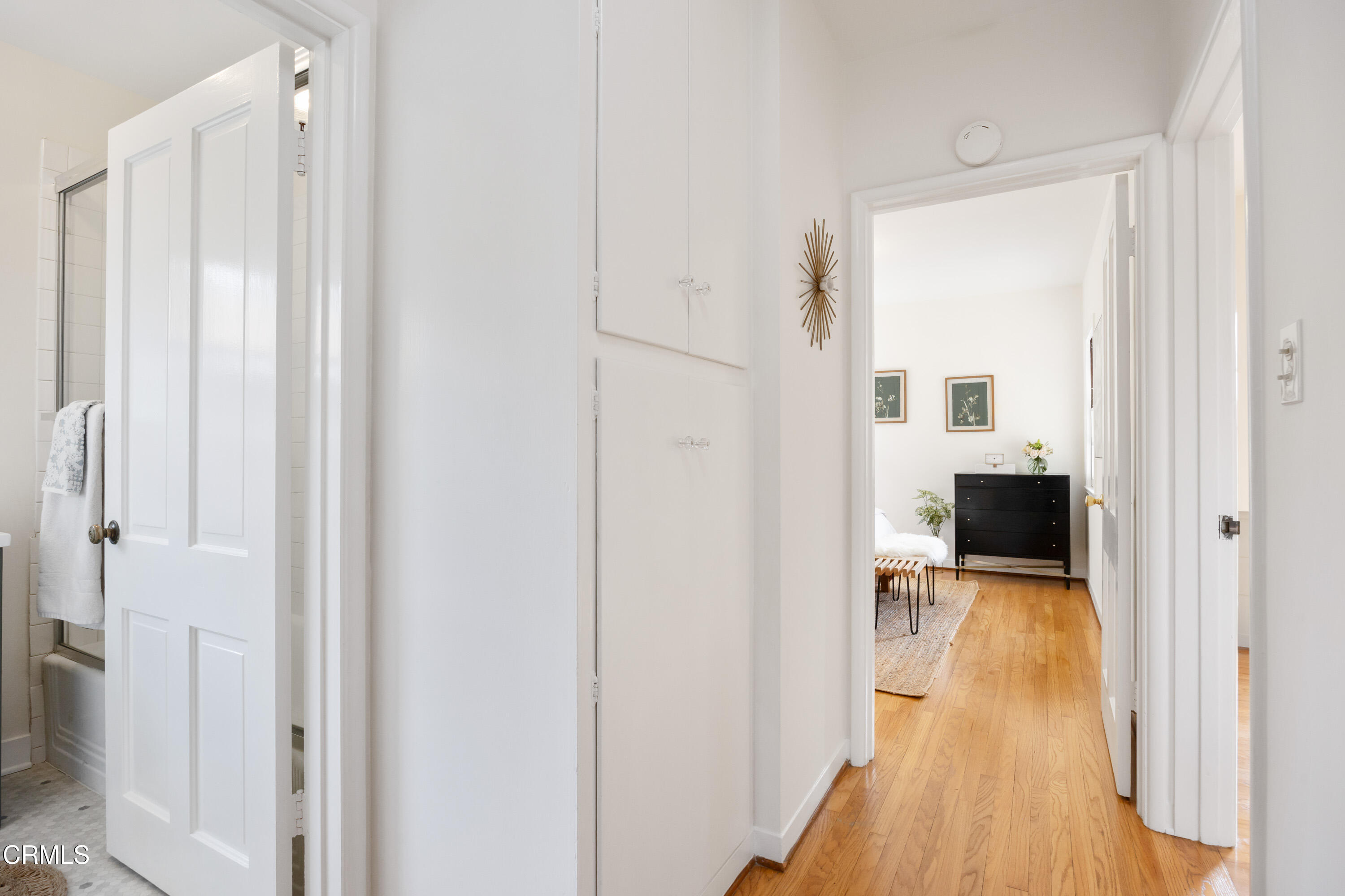 1766-1768 Whitefield Road Pasadena, CA 91104 - Photo 36 of 52 a view of a hallway with wooden floor and a bathroom