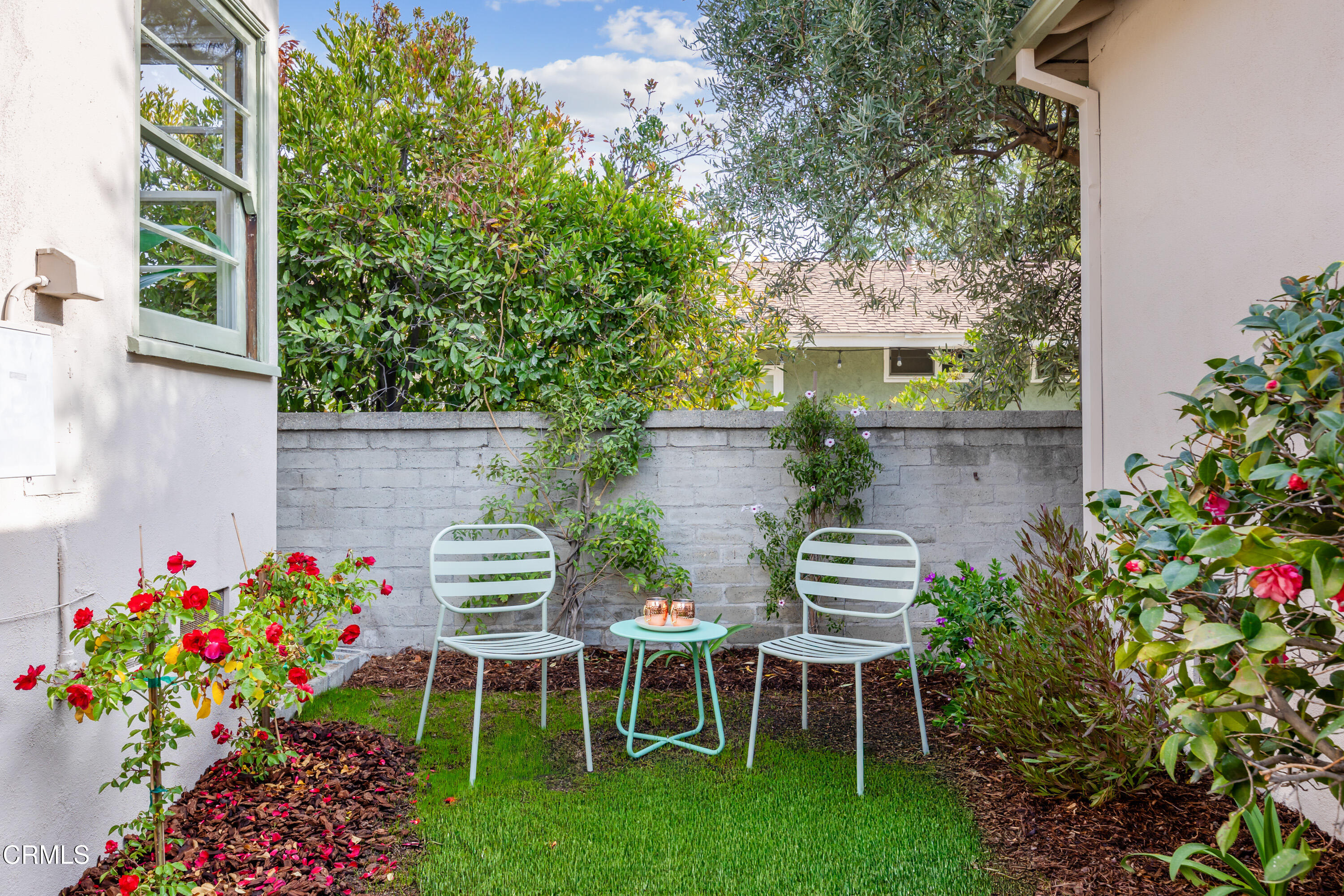 1766-1768 Whitefield Road Pasadena, CA 91104 - Photo 47 of 52 a view of a chair and table in a backyard with plants