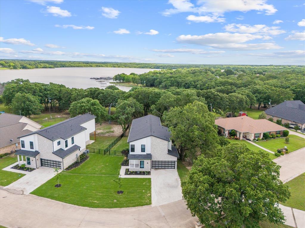 2811 Rodeo Drive Quinlan, TX 75474 - Photo 3 of 35 Bird's eye view of a nearby body of water and a forest
