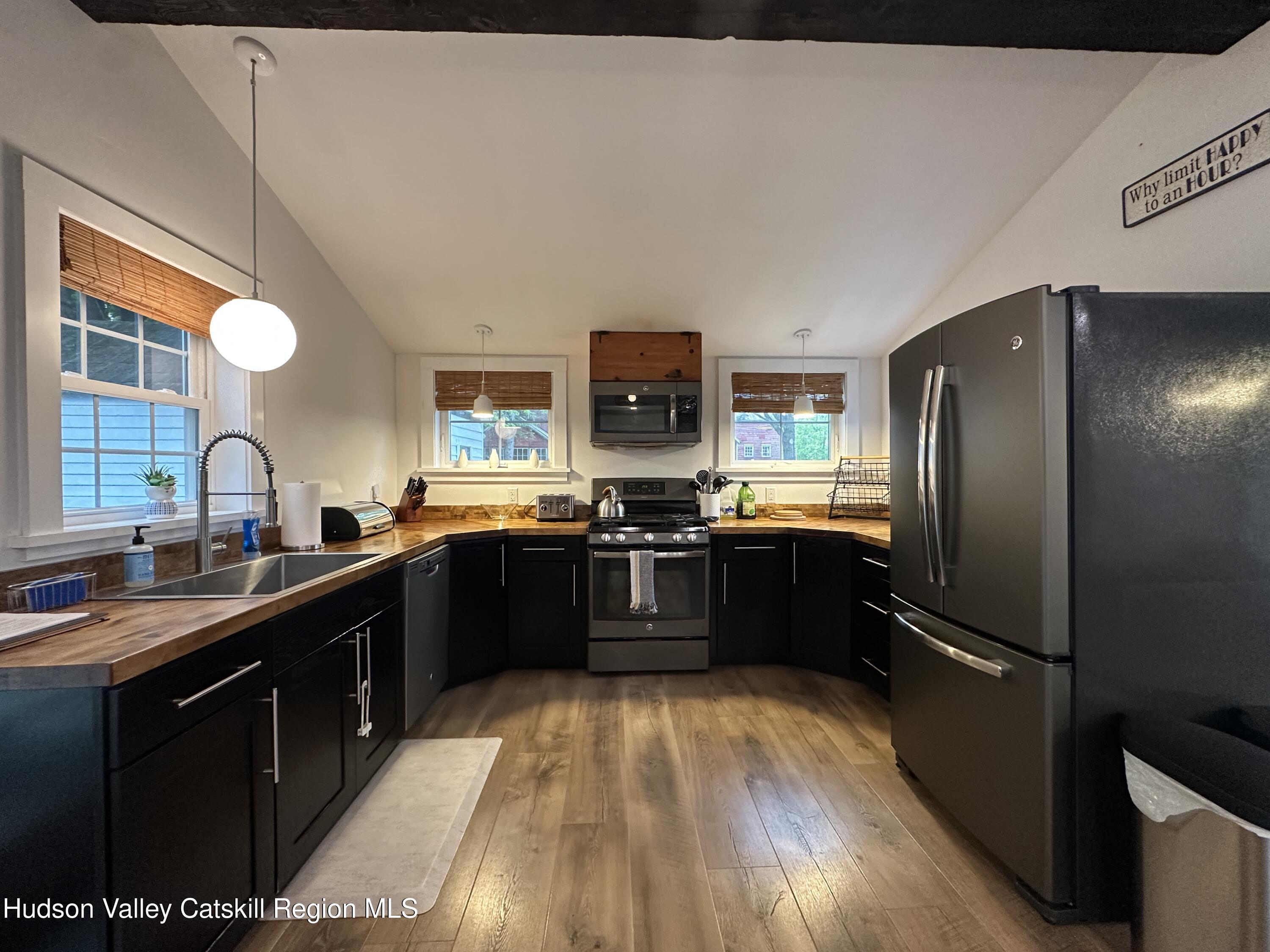 4028-4082 County Rte 26 Greenville, NY 12083 - Photo 13 of 77 a kitchen with stainless steel appliances granite countertop a refrigerator a sink dishwasher a stove and a refrigerator