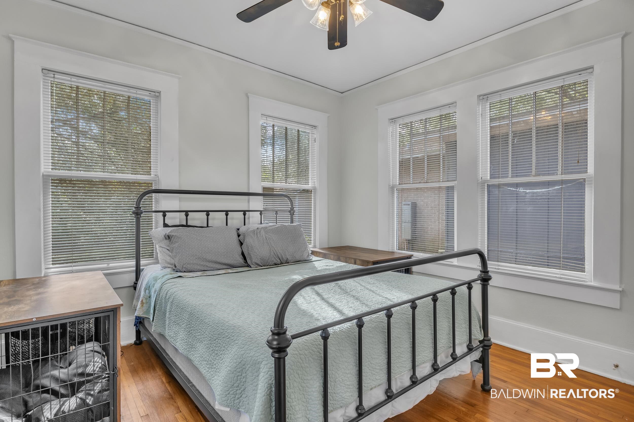 55 Mohawk Street Mobile, AL 36606 - Photo 20 of 28 Bedroom featuring a ceiling fan, baseboards, and hardwood / wood-style floors