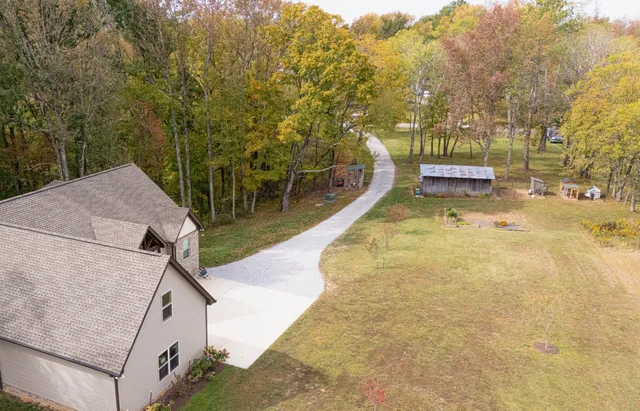 a view of swimming pool with sitting area