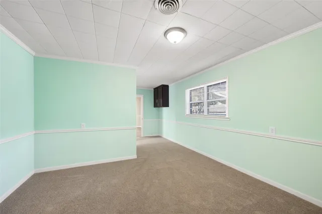 a view of a big room with wooden floor