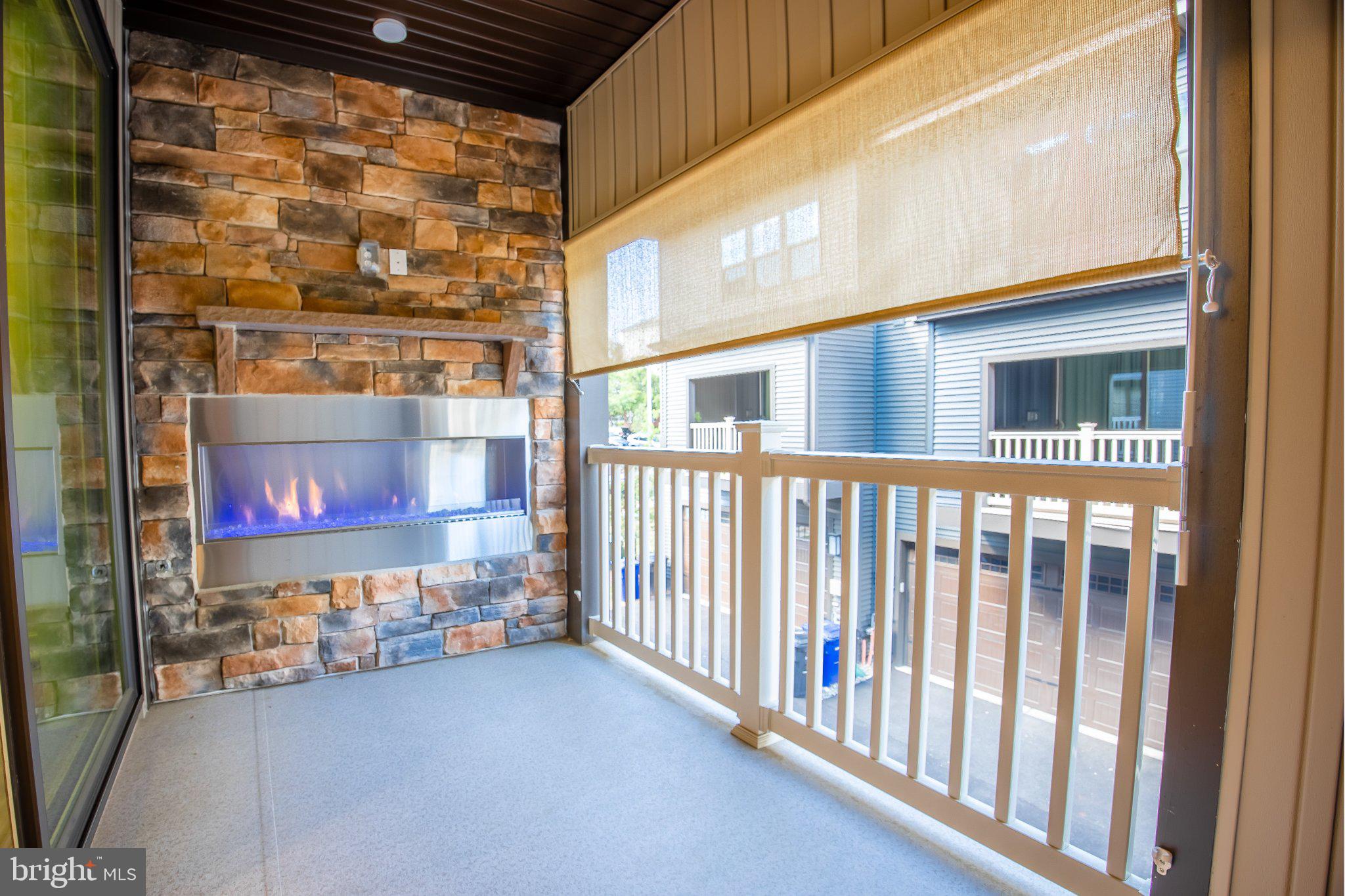 5313 8th Road South Arlington, VA 22204 - Photo 29 of 50 Serene balcony with modern fireplace.