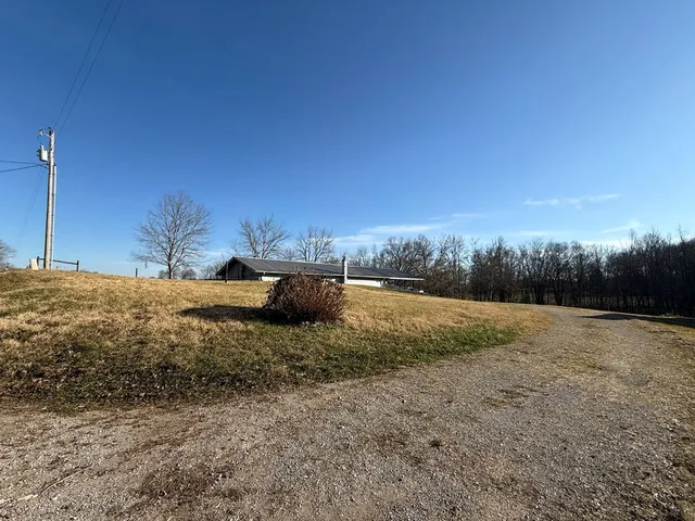 a view of outdoor space and yard