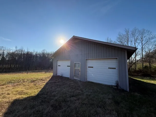 a view of a backyard with a garden