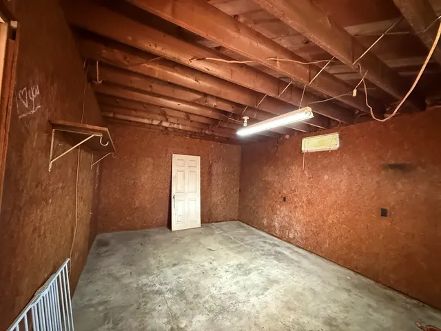 a bathroom with a double vanity sink toilet and shower