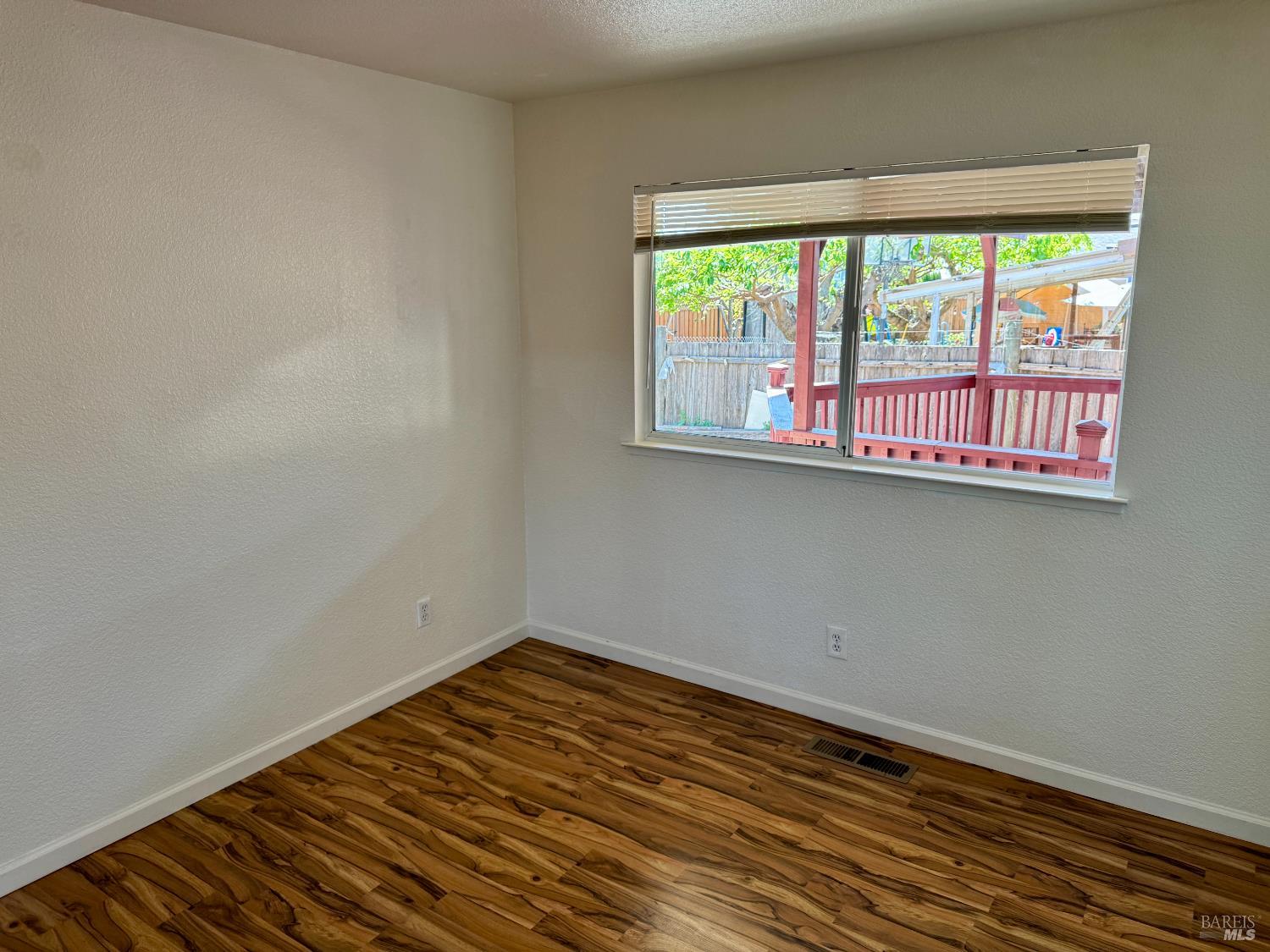 1836 Hearn Avenue Santa Rosa, CA 95407 - Photo 13 of 22 a view of a room with wooden floor and a window