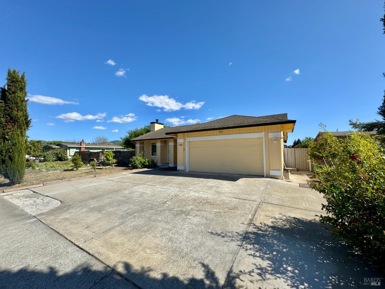 1836 Hearn Avenue Santa Rosa, CA 95407 - Photo 3 of 22 a front view of a house with a yard and garage
