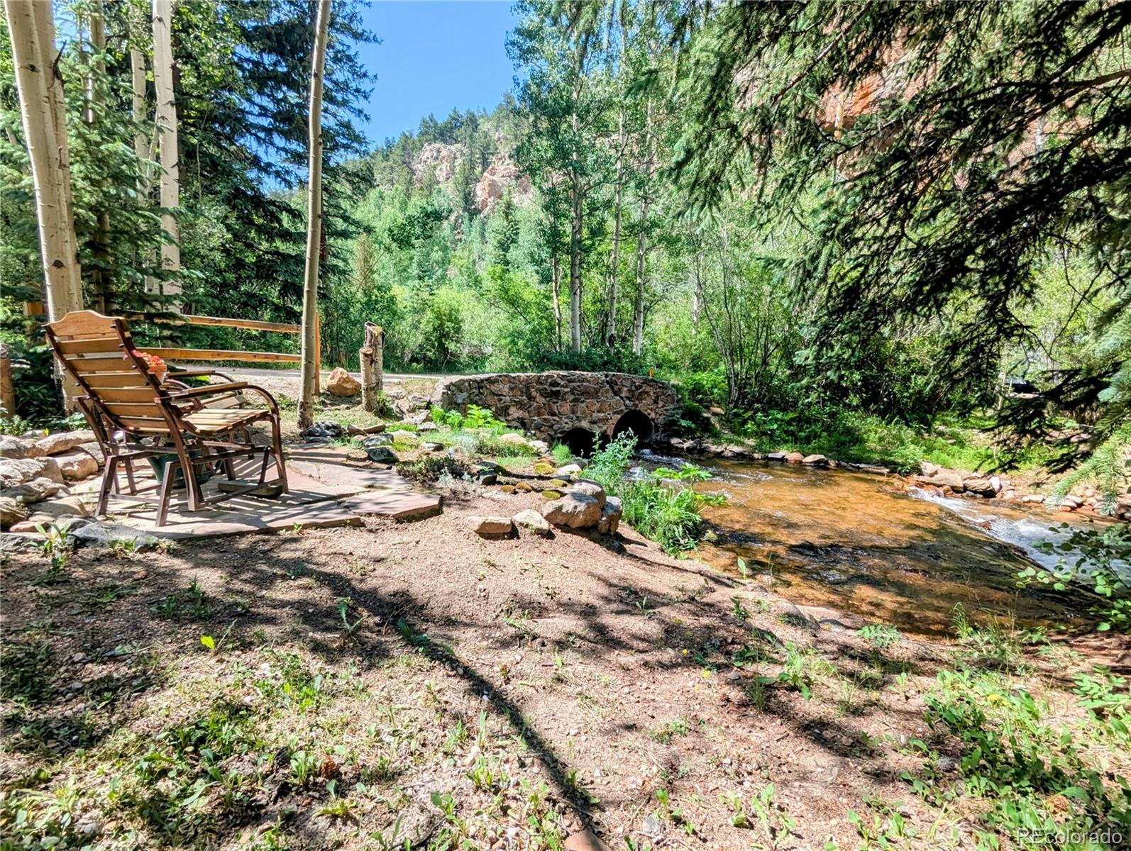 7721 County Road 43 Bailey, CO 80421 - Photo 3 of 49 a view of an outdoor space with seating