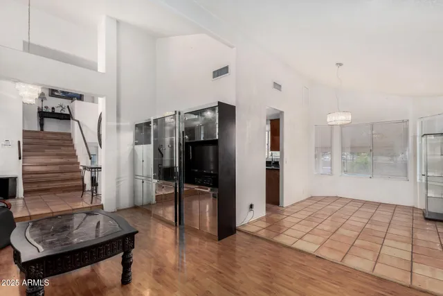 a living room with furniture and a rug