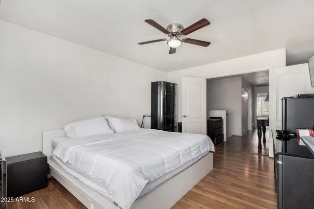 a large white bed in a white room