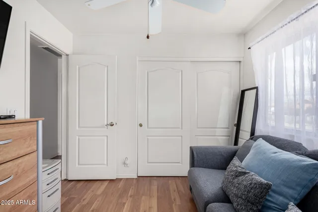 a living room with furniture and a window
