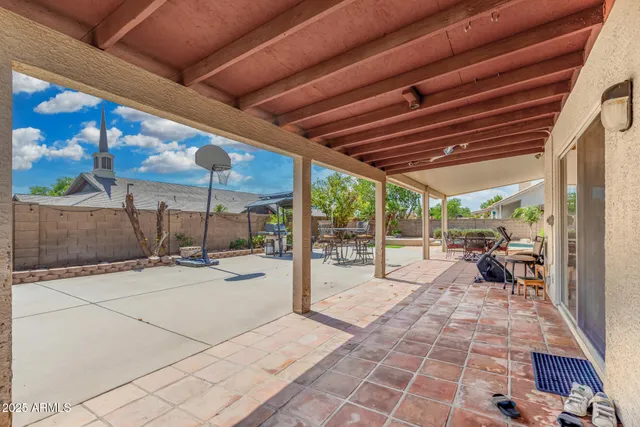 a view of a porch with furniture