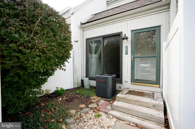 a front view of a house with a porch