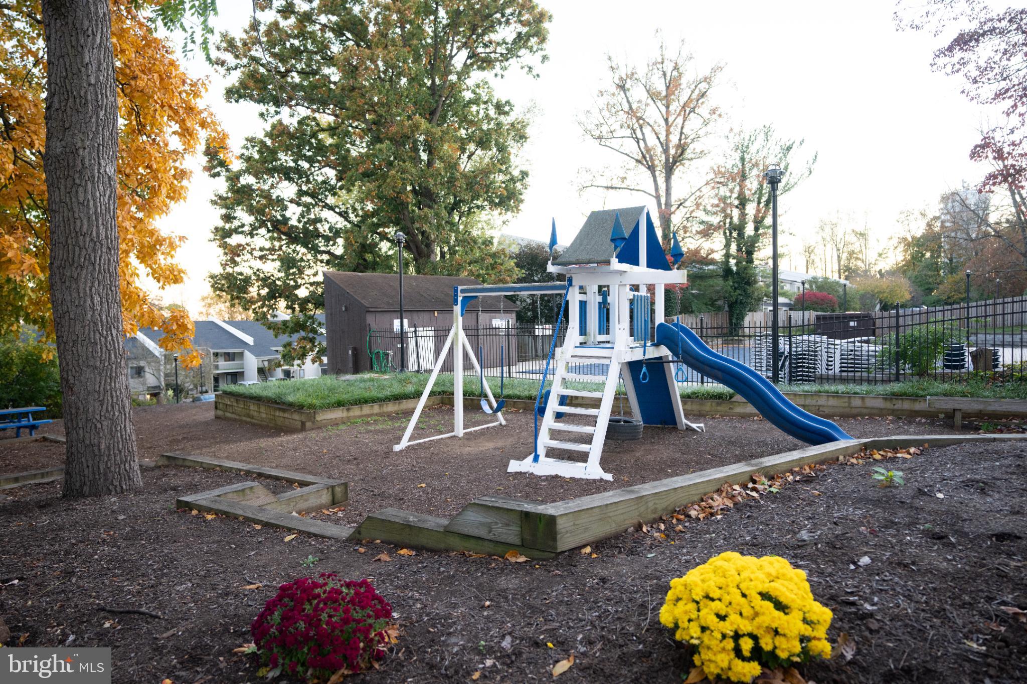 573 Summit House West Chester, PA 19382 - Photo 21 of 24 Tot lot, clubhouse and tennis courts