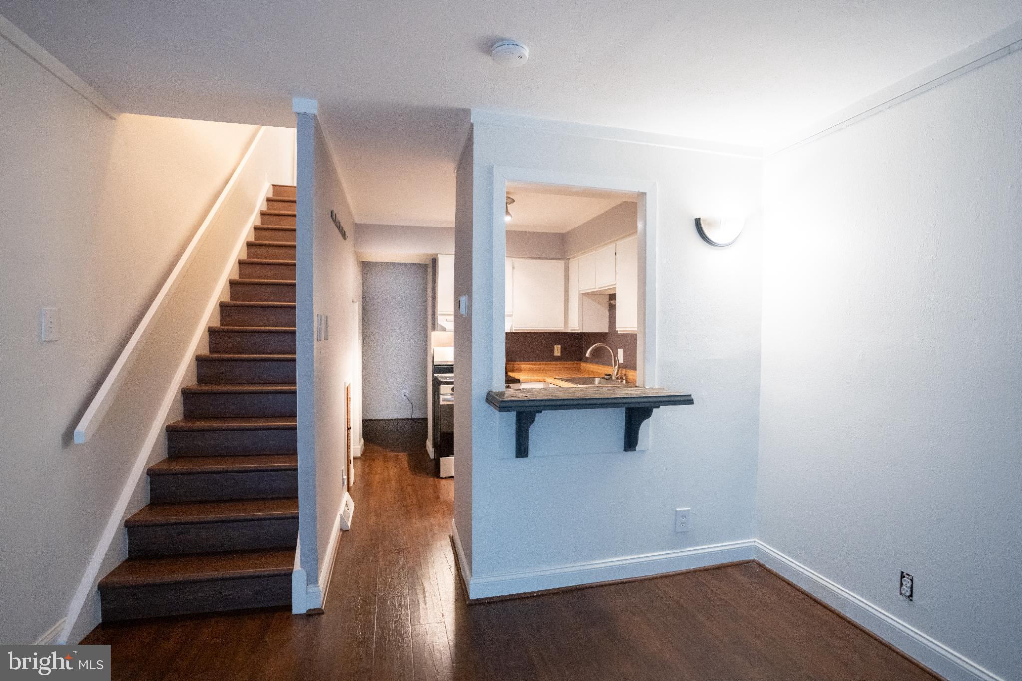 573 Summit House West Chester, PA 19382 - Photo 7 of 20 a view of entryway and hall with wooden floor