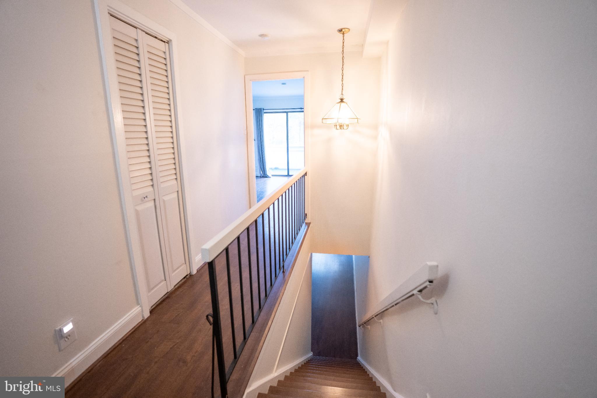 573 Summit House West Chester, PA 19382 - Photo 10 of 20 a view of a hallway with stairs