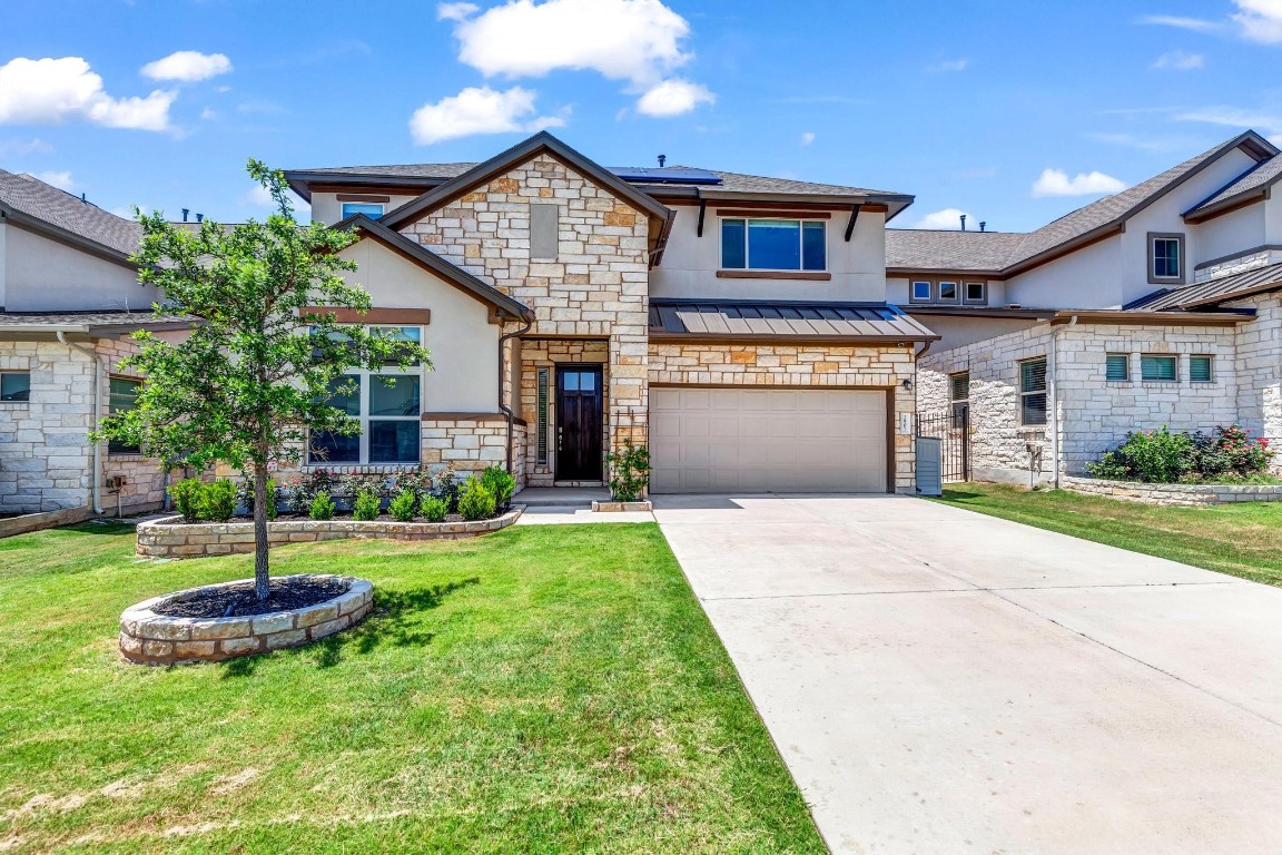 2907 Zelma Drive Cedar Park, TX 78613 - Photo 1 of 1 a front view of a house with a yard and garage