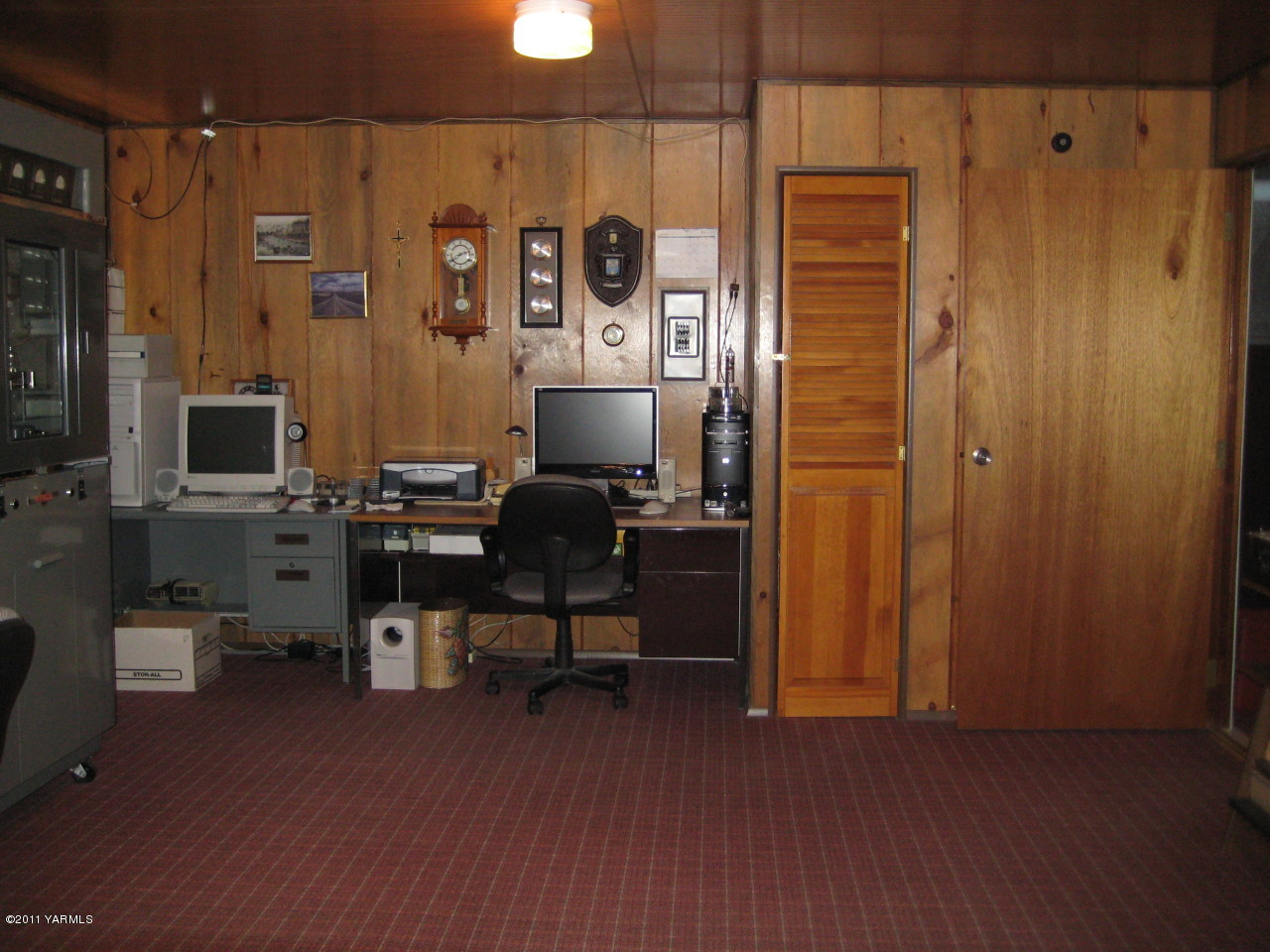 4572 Lombard Loop Road Zillah, WA 98953 - Photo 2 of 33 a view of a workspace with furniture and wooden floor