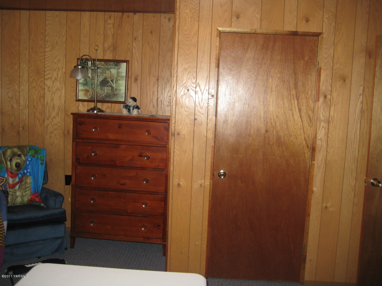 4572 Lombard Loop Road Zillah, WA 98953 - Photo 5 of 33 a view of a hallway with closet and toys