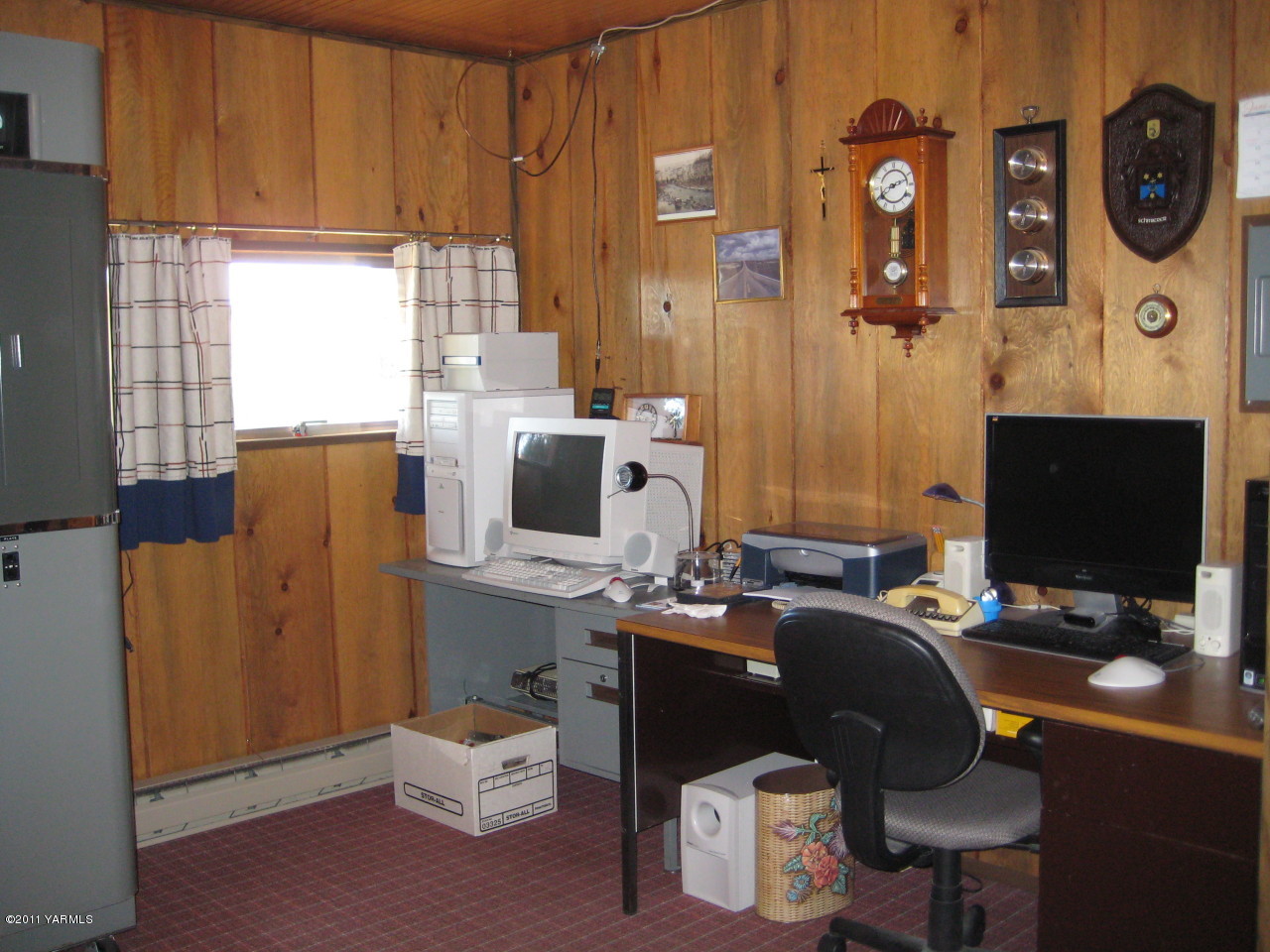 4572 Lombard Loop Road Zillah, WA 98953 - Photo 9 of 33 a view of a workspace with furniture and a window