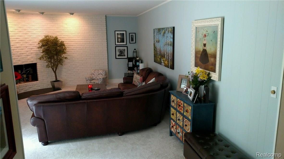 710 Rutgers Road Rochester, MI 48309 - Photo 12 of 31 Family room with natural fireplace