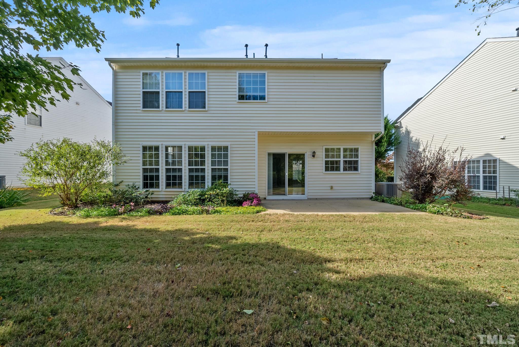 7432 Silver View Lane Raleigh, NC 27613 - Photo 23 of 28 a front view of a house with a yard