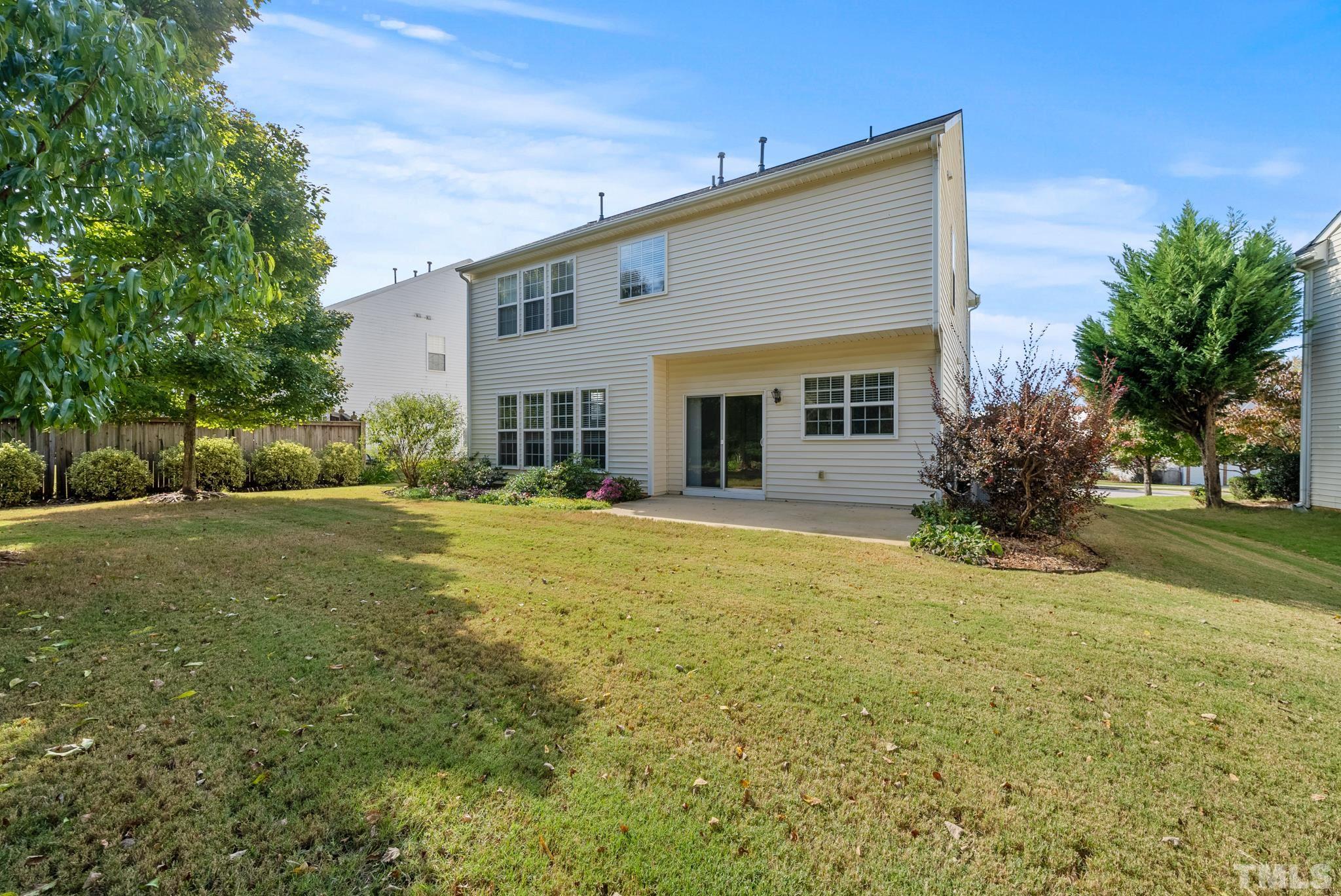 7432 Silver View Lane Raleigh, NC 27613 - Photo 24 of 28 a front view of house with yard and green space