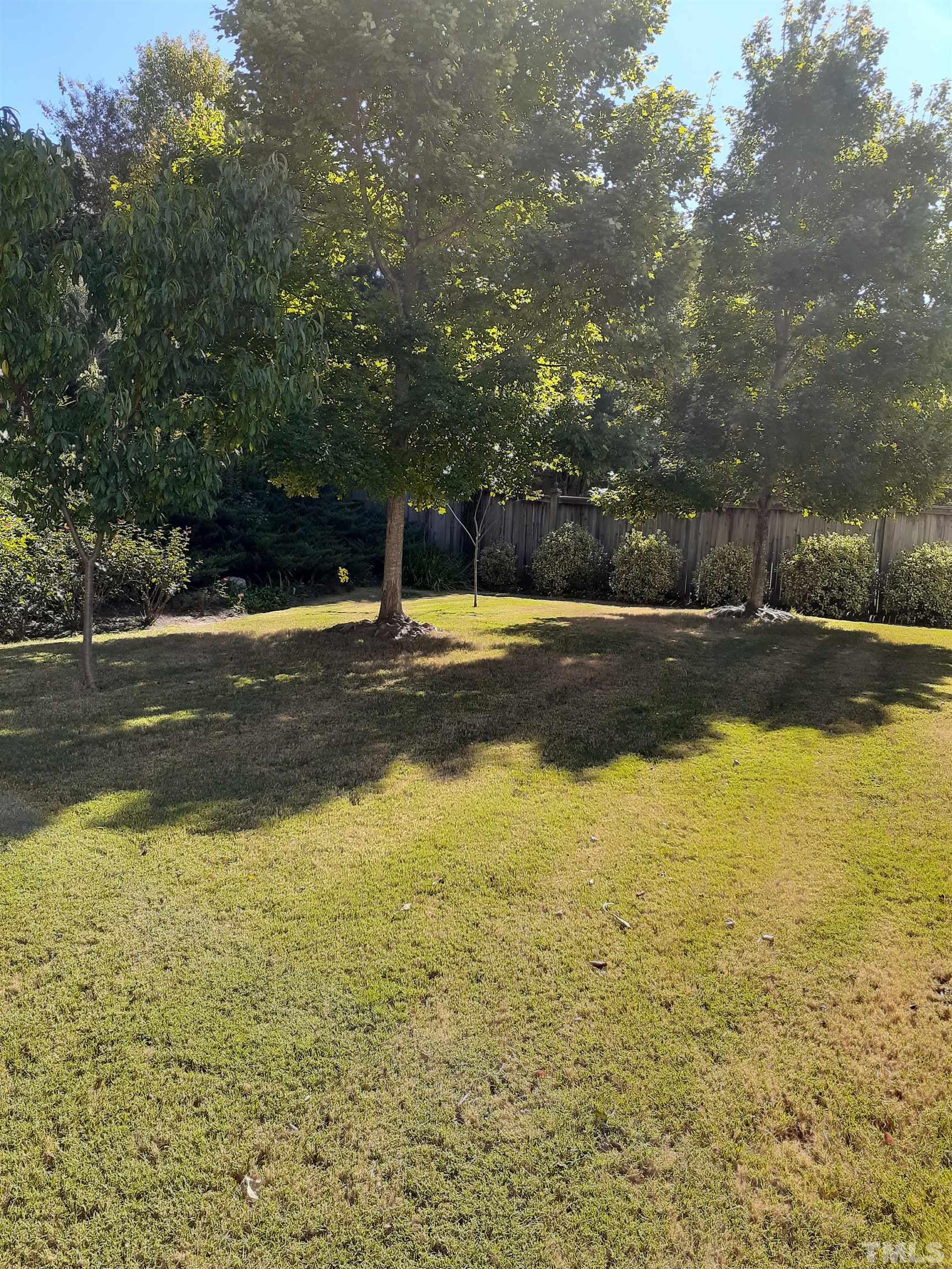 7432 Silver View Lane Raleigh, NC 27613 - Photo 6 of 28 a view of a swimming pool with an outdoor space and seating area