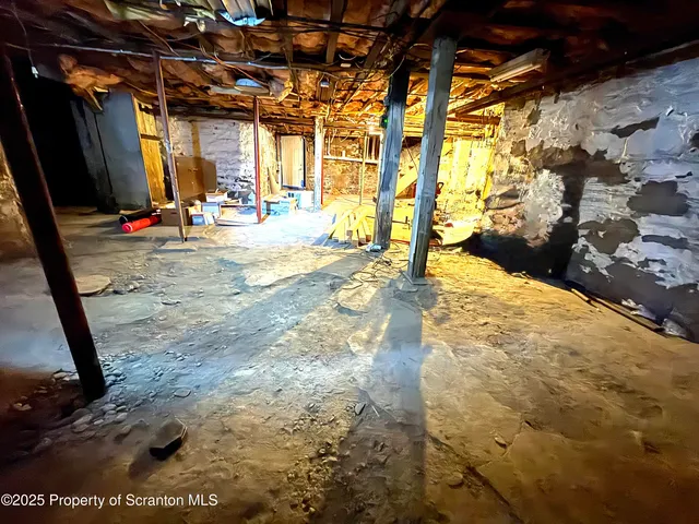 a view of a backyard of the house