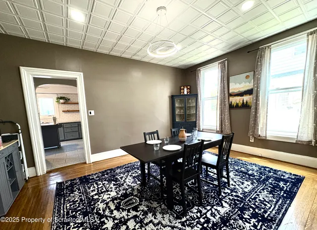 a view of a dining room with furniture