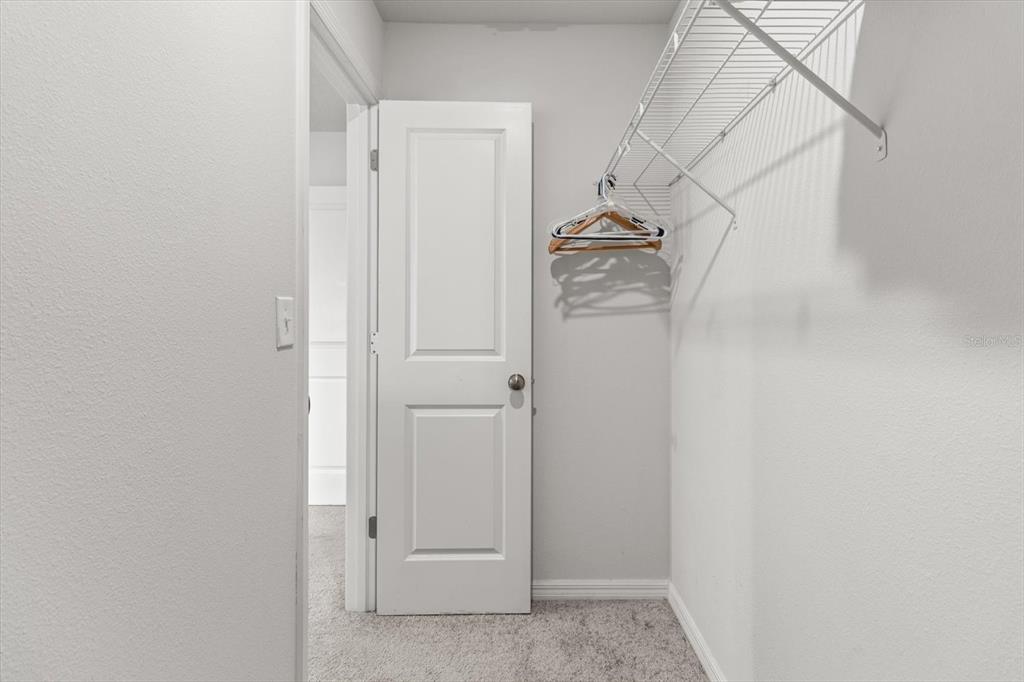 3332 Lambert Avenue Spring Hill, FL 34608 - Photo 15 of 30 a view of walk in closet