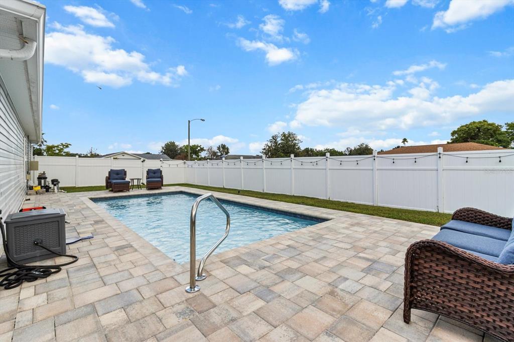3332 Lambert Avenue Spring Hill, FL 34608 - Photo 27 of 30 a view of a terrace with chairs
