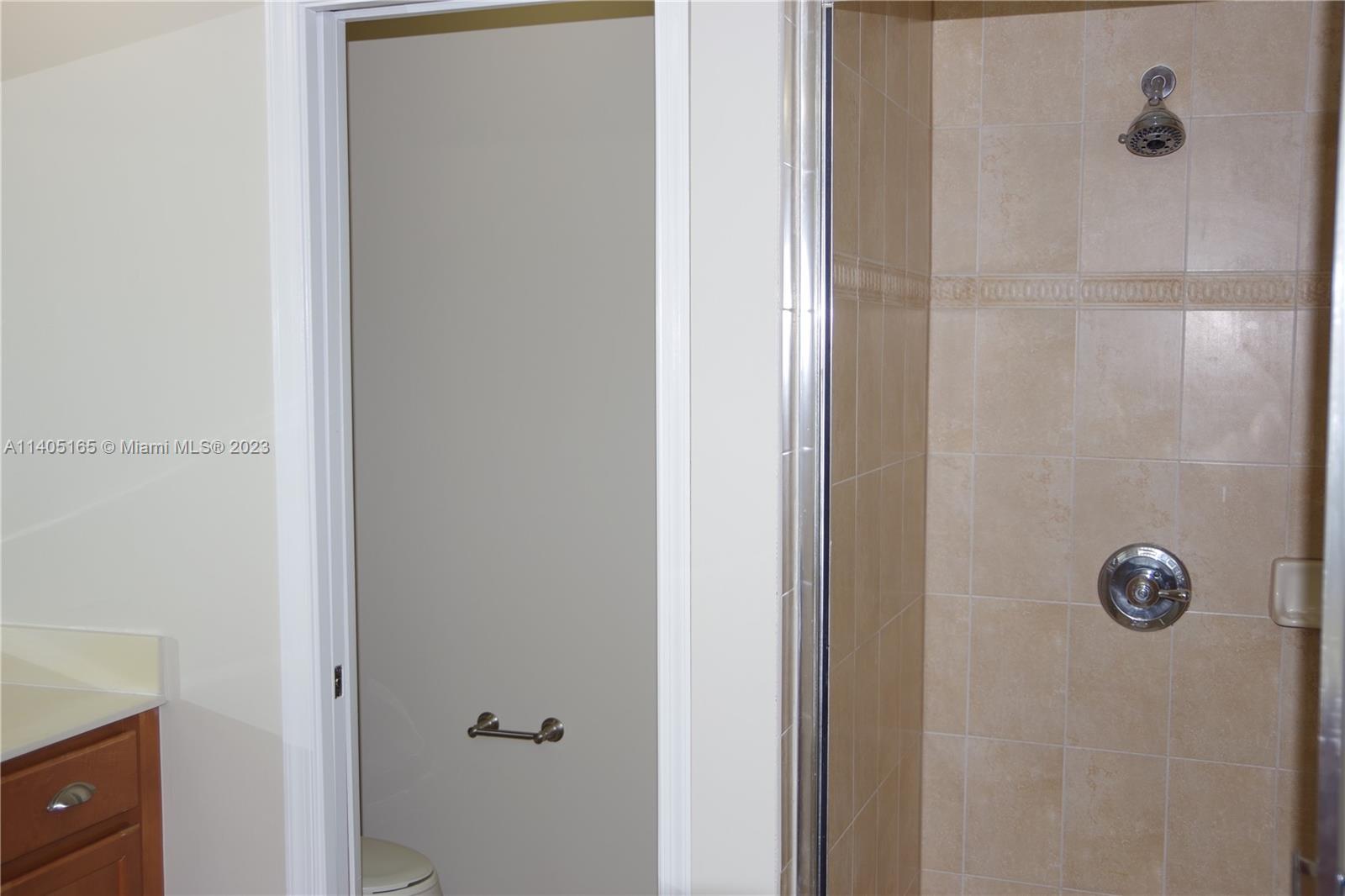Walden Miami Gardens, FL 33169 - Photo 19 of 33 a bathroom with a shower