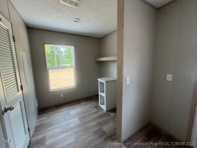 385 Page Road Godwin, NC 28344 - Photo 17 of 18 a view of an empty room with a window and wooden floor