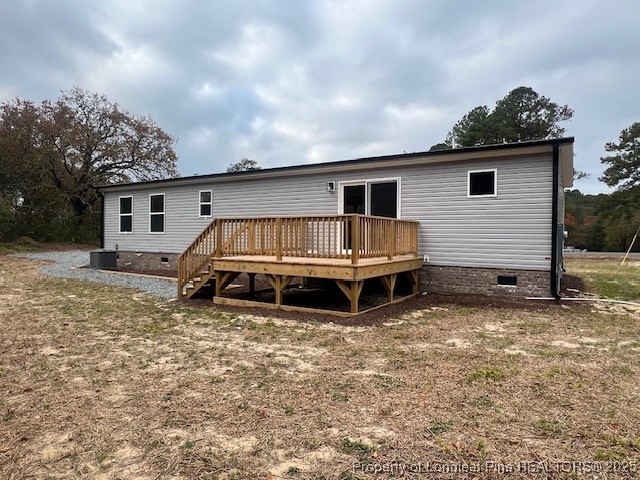 385 Page Road Godwin, NC 28344 - Photo 18 of 18 a house with wooden fence